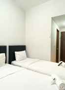 BEDROOM Modern 12th Floor Studio at Transpark Juanda Bekasi Timur Apartment By Travelio