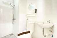 Toilet Kamar Nice and Clean Studio at Grand Asia Afrika Apartment By Travelio