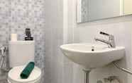 In-room Bathroom 5 Cozy and Tidy Studio at Tokyo Riverside PIK 2 Apartment By Travelio