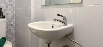 In-room Bathroom 6 Cozy and Tidy Studio at Tokyo Riverside PIK 2 Apartment By Travelio