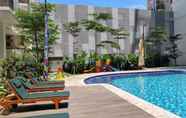 Swimming Pool 6 Minimalist and Comfort Stay Studio at Signature Park Grande Apartment By Travelio