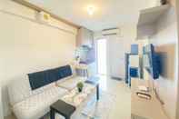 Ruang Umum Cozy and Beautiful 2BR Bassura City Apartment By Travelio