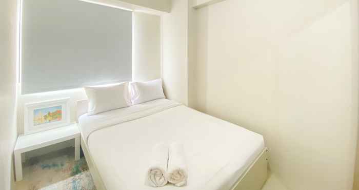 Bedroom Cozy and Beautiful 2BR Bassura City Apartment By Travelio