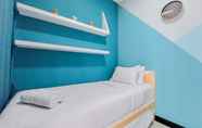 Kamar Tidur 2 Comfortable and Scenic 2BR Apartment M-Town Residence By Travelio