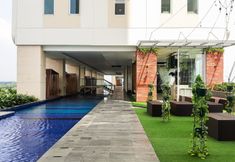 Swimming Pool 6 Cozy and Simply Look Studio Apartment at B Residence By Travelio