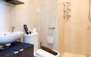 In-room Bathroom 6 Minimalist and Warm 2BR at Northland Ancol Apartment By Travelio