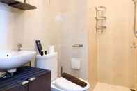 In-room Bathroom Minimalist and Warm 2BR at Northland Ancol Apartment By Travelio