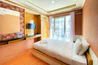 Bedroom Cozy and Simply Studio at Grand Asia Afrika Apartment By Travelio