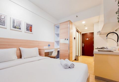Bedroom Elegant Studio near AEON Mall at Sky House BSD Apartment By Travelio