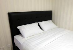 Bedroom 2 Comfort 1BR Apartment The Mansion Kemayoran By Travelio