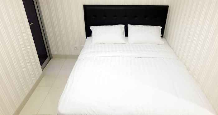 ห้องนอน Comfort 1BR Apartment The Mansion Kemayoran By Travelio