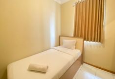 Bedroom 2 Homey and Nice 2BR at Grand Palace Kemayoran Apartment By Travelio