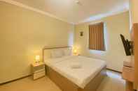 Bedroom Homey and Nice 2BR at Grand Palace Kemayoran Apartment By Travelio