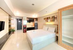 Bedroom 2 Best Location Studio Apartment at Tamansari La Grande By Travelio