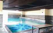 Swimming Pool 4 Best Location Studio Apartment at Tamansari La Grande By Travelio