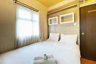 Bedroom Simply and Homey 2BR at Suites @Metro Apartment By Travelio
