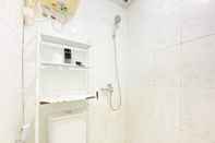 In-room Bathroom Simply and Homey 2BR at Suites @Metro Apartment By Travelio