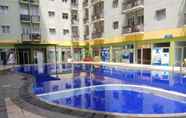 Swimming Pool 7 Simply and Homey 2BR at Suites @Metro Apartment By Travelio