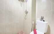 In-room Bathroom 3 Simply and Homey Designed Studio at Taman Melati Jatinangor Apartment By Travelio