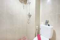 In-room Bathroom Simply and Homey Designed Studio at Taman Melati Jatinangor Apartment By Travelio