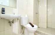 In-room Bathroom 6 Minimalist and Best Deal 2BR at Springlake Summarecon Bekasi Apartment By Travelio