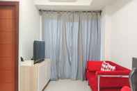 Common Space Tidy and Comfortable 2BR at Vida View Apartment By Travelio