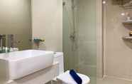 In-room Bathroom 5 Enjoy Living and Comfort 2BR at Daan Mogot City Apartment By Travelio