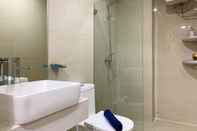 In-room Bathroom Enjoy Living and Comfort 2BR at Daan Mogot City Apartment By Travelio