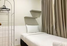Bedroom 2 Enjoy Living and Comfort 2BR at Daan Mogot City Apartment By Travelio