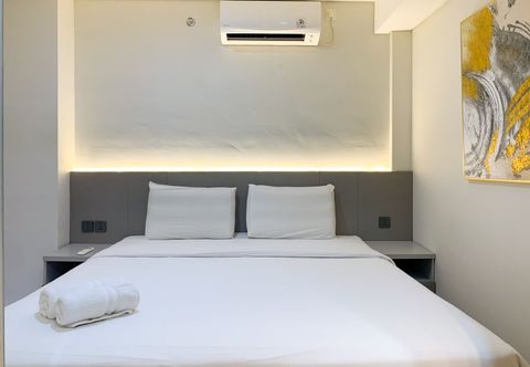 Bedroom Enjoy Living and Comfort 2BR at Daan Mogot City Apartment By Travelio