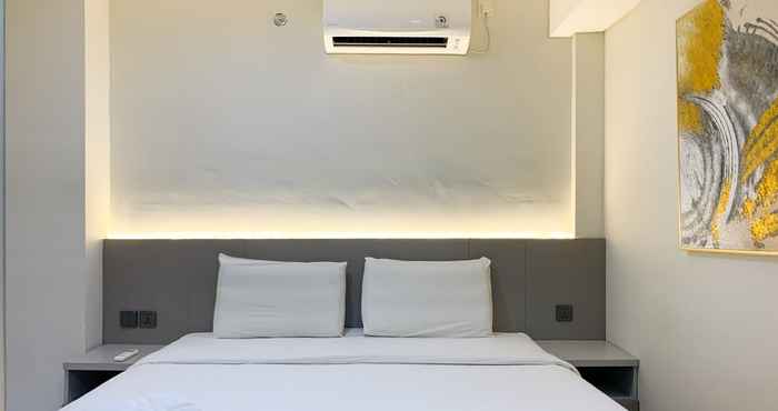 Kamar Tidur Enjoy Living and Comfort 2BR at Daan Mogot City Apartment By Travelio