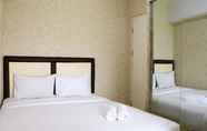 Bedroom 2 Homey and Minimalist 2BR at Springlake Summarecon Bekasi Apartment By Travelio