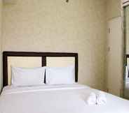 Bedroom 2 Homey and Minimalist 2BR at Springlake Summarecon Bekasi Apartment By Travelio