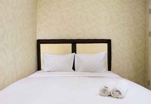 Bedroom Homey and Minimalist 2BR at Springlake Summarecon Bekasi Apartment By Travelio