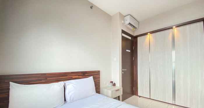 Bedroom Cozy and Chic 2BR at Mekarwangi Square Cibaduyut Apartment By Travelio