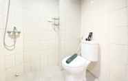 Toilet Kamar 5 Cozy and Chic 2BR at Mekarwangi Square Cibaduyut Apartment By Travelio