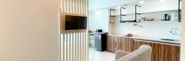 Lobi Minimalist and Strategic Studio at Grand Kamala Lagoon Apartment By Travelio