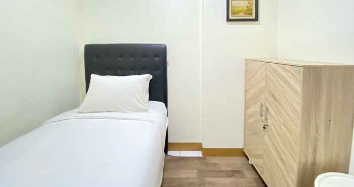 Phòng ngủ Graceful 2BR at Gateway Ahmad Yani Cicadas Apartment By Travelio