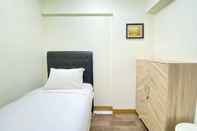 Bedroom Graceful 2BR at Gateway Ahmad Yani Cicadas Apartment By Travelio