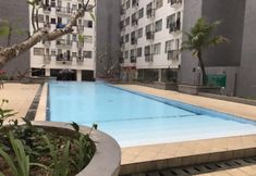 Swimming Pool 5 Spacious and Unique 1BR Apartment at Jarrdin Cihampelas By Travelio
