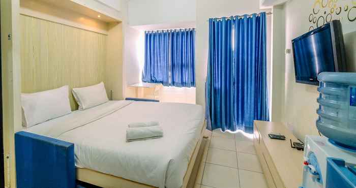 Bedroom Homey Studio Apartment at 10th Floor Margonda Residence 5 By Travelio