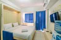 Kamar Tidur Homey Studio Apartment at 10th Floor Margonda Residence 5 By Travelio