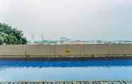 Swimming Pool 7 Homey Studio Apartment at 10th Floor Margonda Residence 5 By Travelio