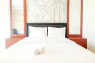 Bedroom Elegant and MInimalist Studio Apartment at Mataram City By Travelio