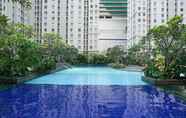 Swimming Pool 7 Modern and Large 2BR Apartment at Green Bay Pluit Facing Spectacular Sea View By Travelio