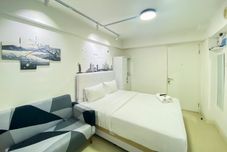 ห้องนอน Modern Design and Cozy Studio Apartment at Bassura City By Travelio