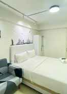 BEDROOM Modern Design and Cozy Studio Apartment at Bassura City By Travelio