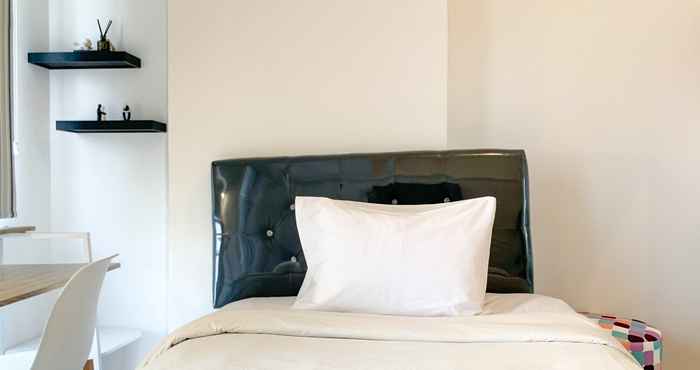 Bilik Tidur Simply Look and Homey Studio Apartment at Tokyo Riverside PIK 2 By Travelio