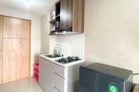 Common Space Well Furnished and Cozy Studio Apartment at Gateway Park LRT City Bekasi By Travelio