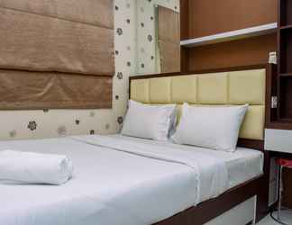 Bedroom 2 Comfortable and Strategic 2BR Apartment at Green Pramuka City By Travelio